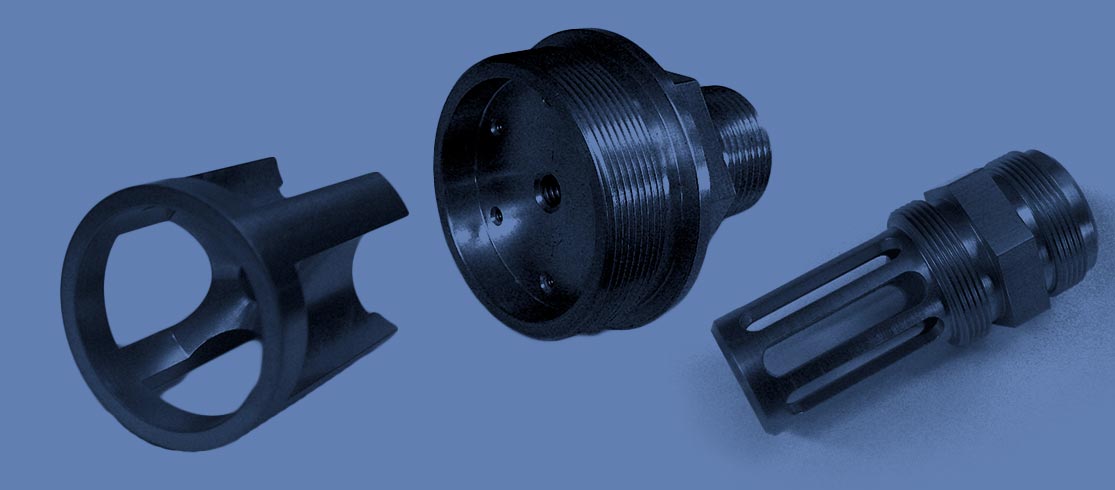 Three black metal components on a blue background