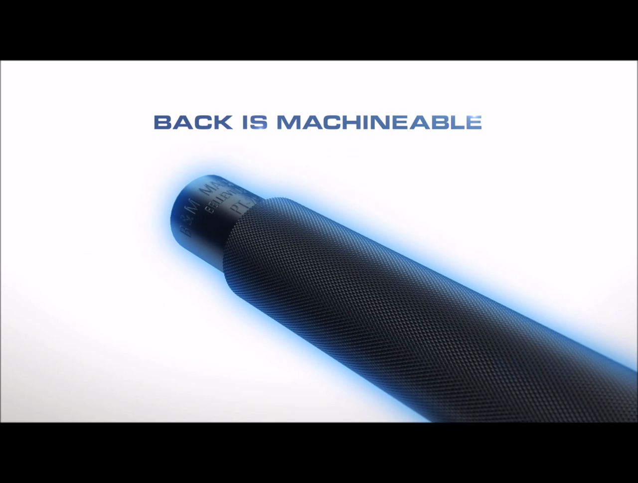 Black cylindrical object with blue light on a white background, text 'BACK IS MACHINEABLE' above.